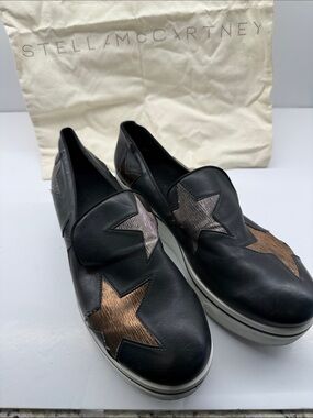 Stella McCartney Black Slip-On Sneakers with Metallic Star Appliqués